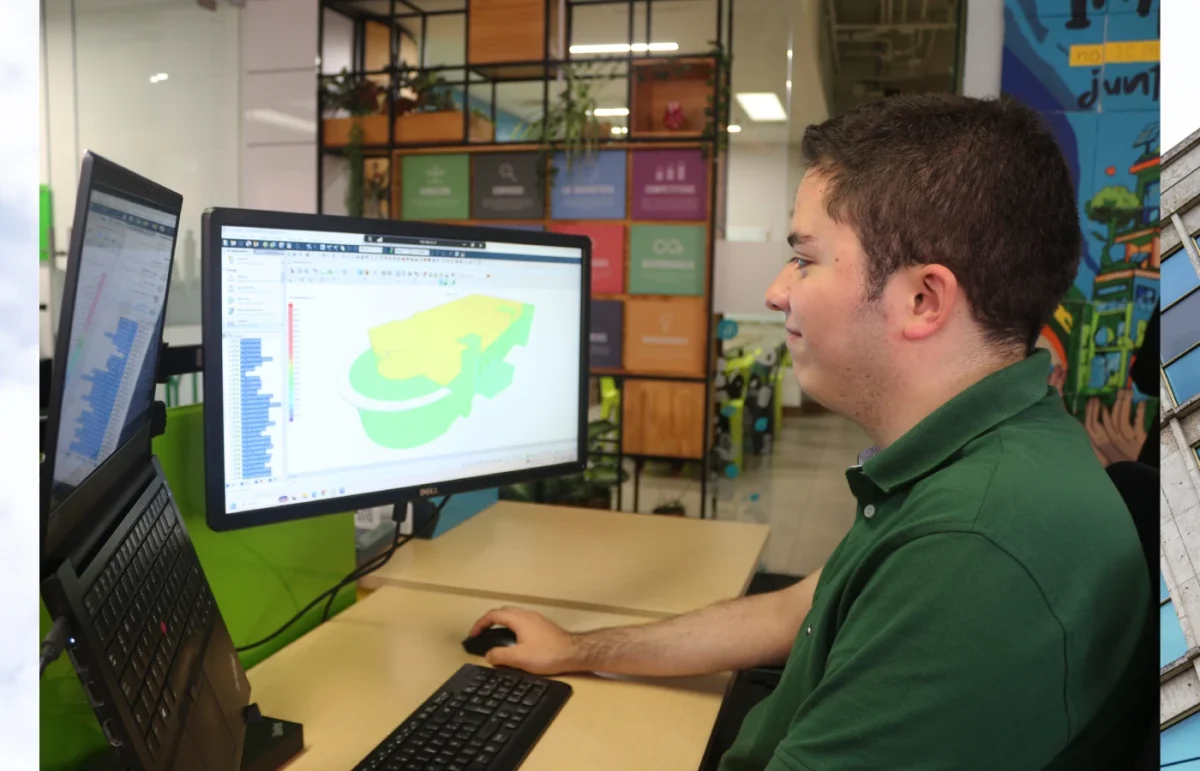 Engineer and architect on a PC modeling a 3D building