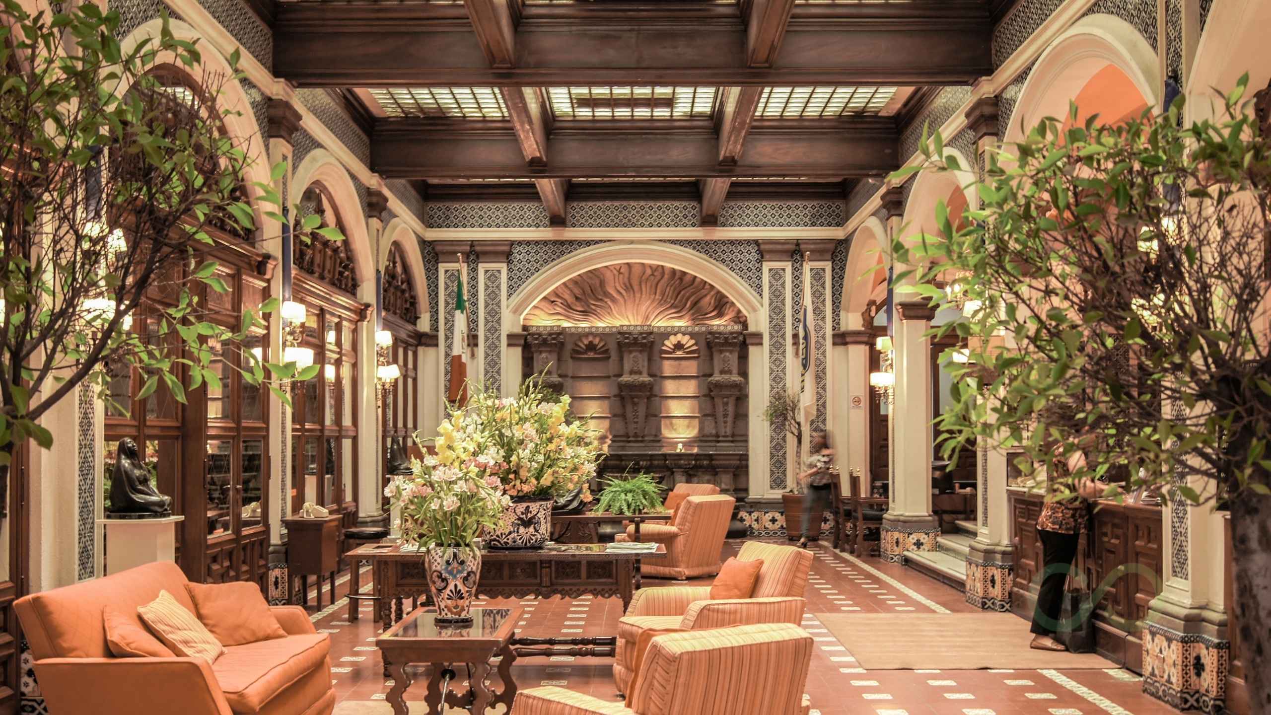 Historic hotel lobby with ornate architecture, indoor greenery, and traditional Moroccan-inspired design Regenerative Hospitality for US and Caribbean Hotels in Green Loop 2026