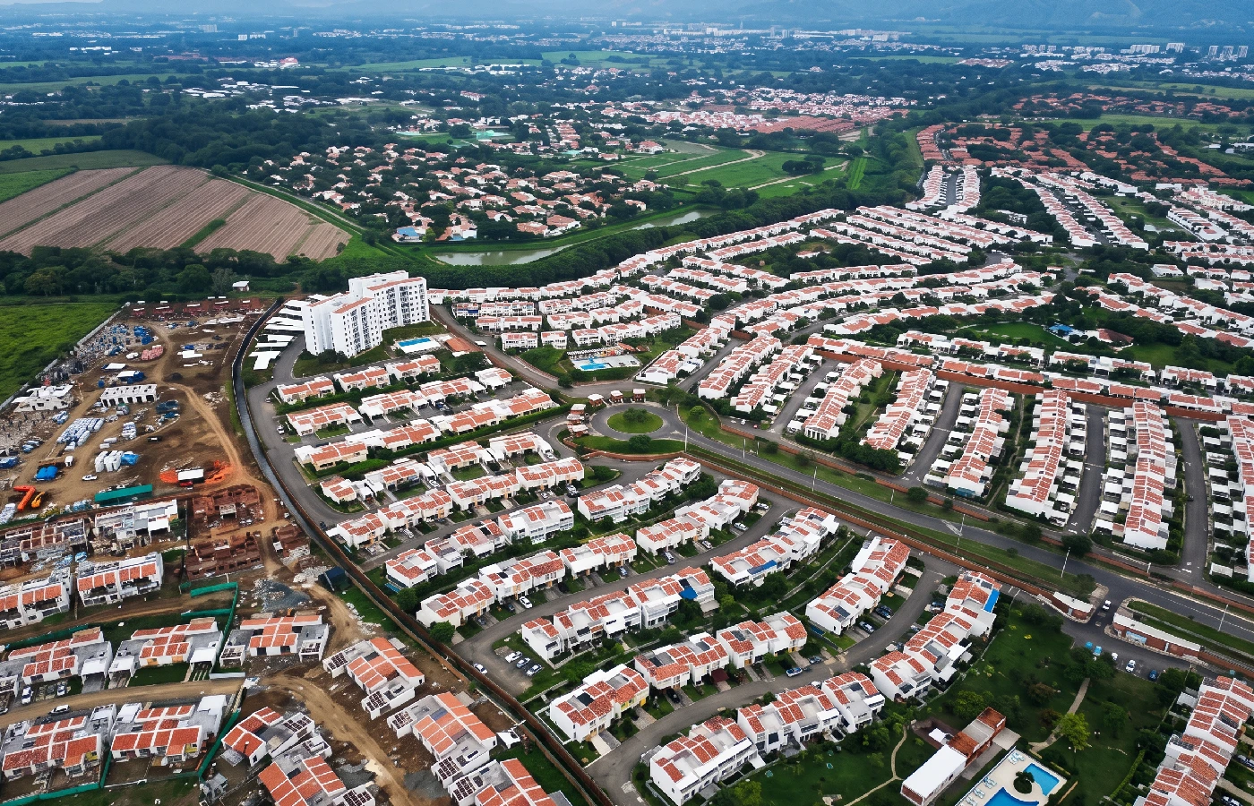 Residential development under construction in Jamundí, Colombia, near the site's restored wetland