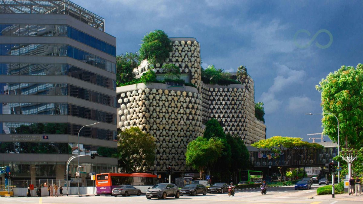 Modern urban architecture featuring a distinctive geometric building with rooftop greenery, surrounded by office buildings, trees, and busy city traffic How to integrate: new build vs retrofit green loop